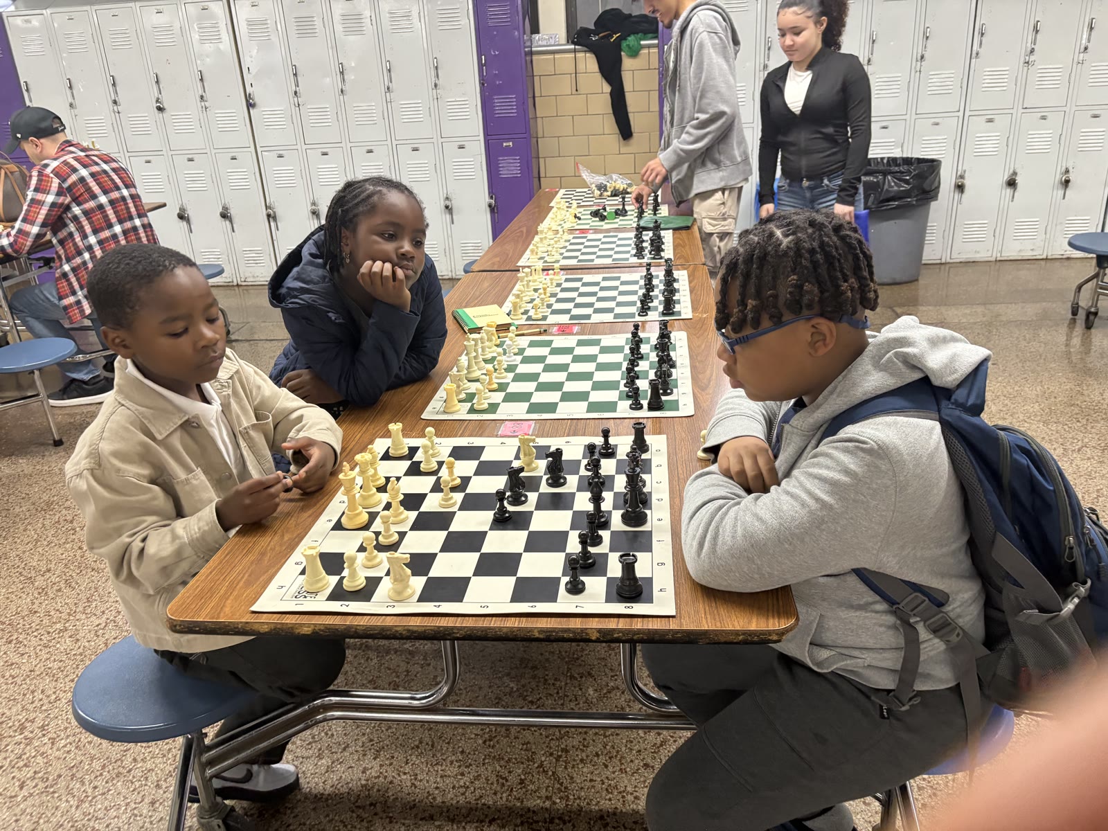 Xavier playing chess in the community 5